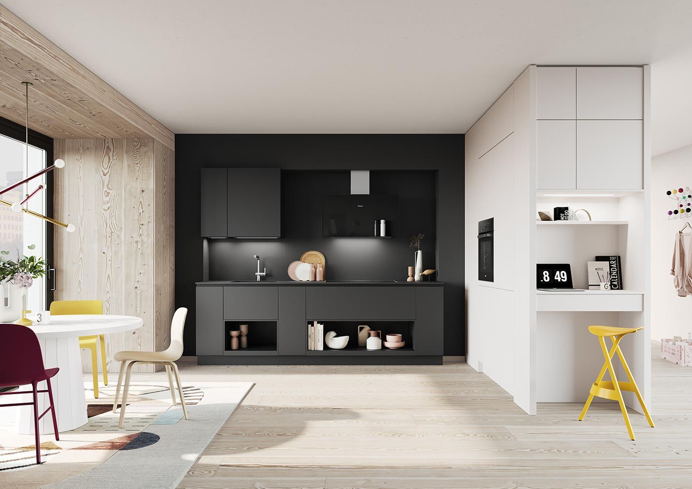 Schwarze Küche neben weißem Wandschrank Eine Schwarze Küche in offenen Raum neben einem weißen Wandschrank mit eingebauten Backofen und einem kleinen Arbeitsbereich